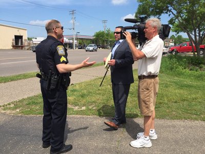 Photo: Paul Blume - Interviewing Hopkins, MN police officials